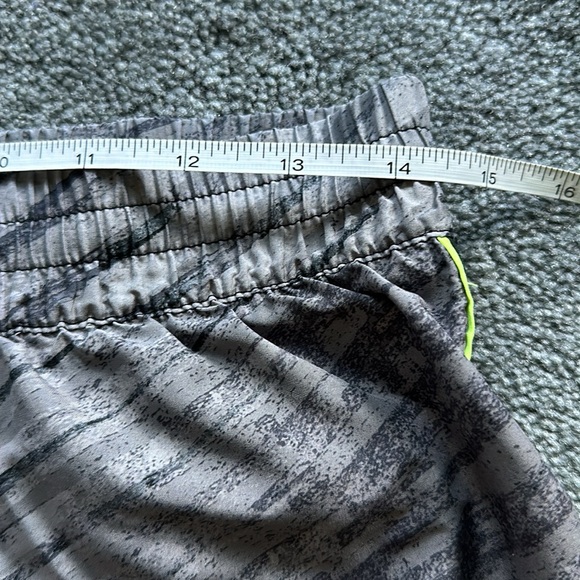 Two pair of Under Armour running shorts. - Picture 8 of 11